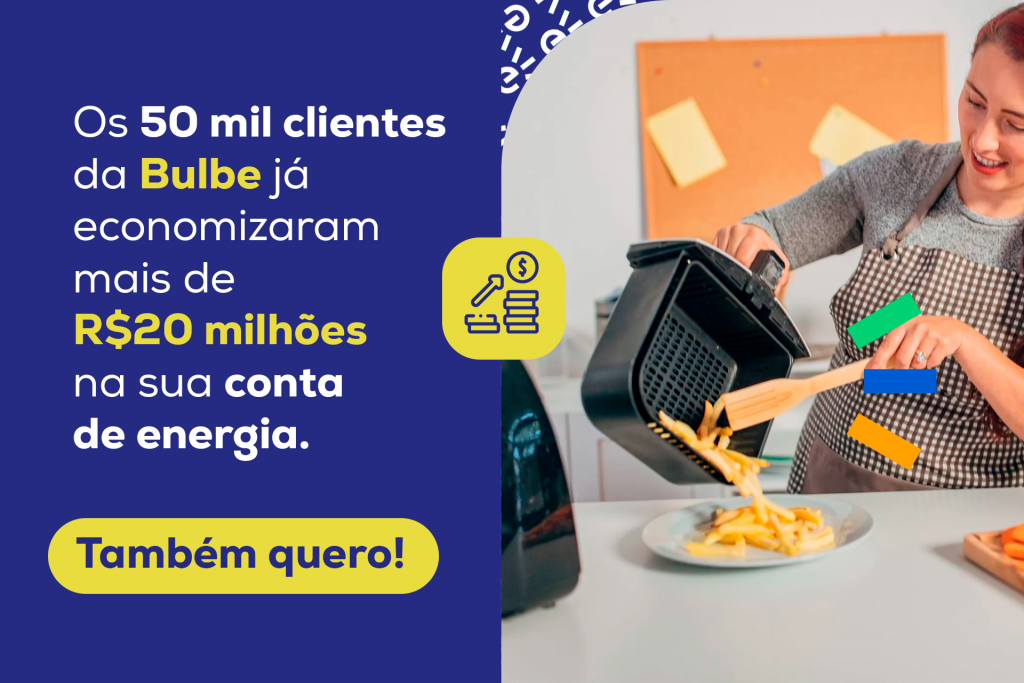 Mulher sorridente usando air fryer, promovendo economia de energia com a Bulbe.